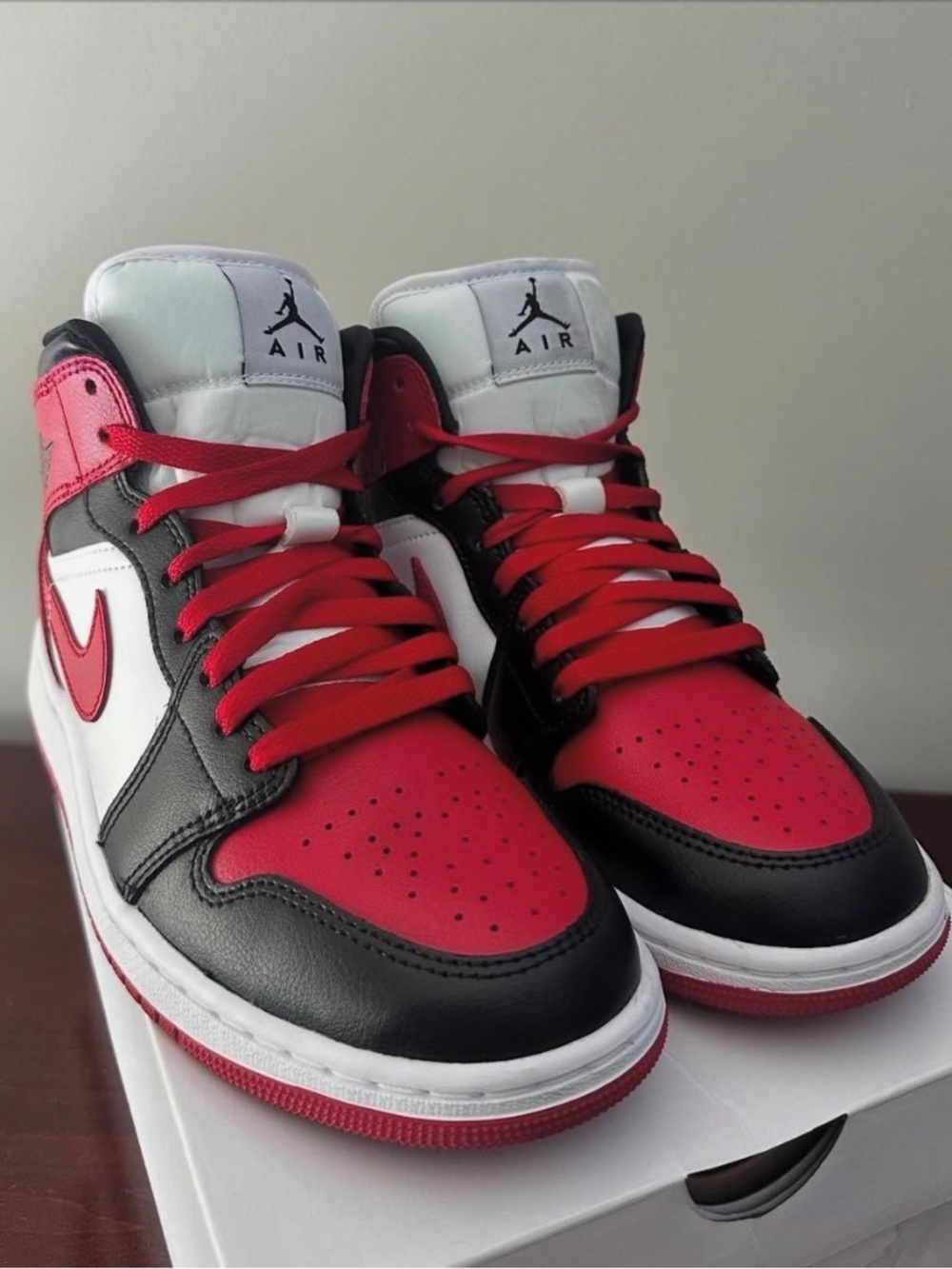 Women’s Red Air Jordan 1, Mid rise